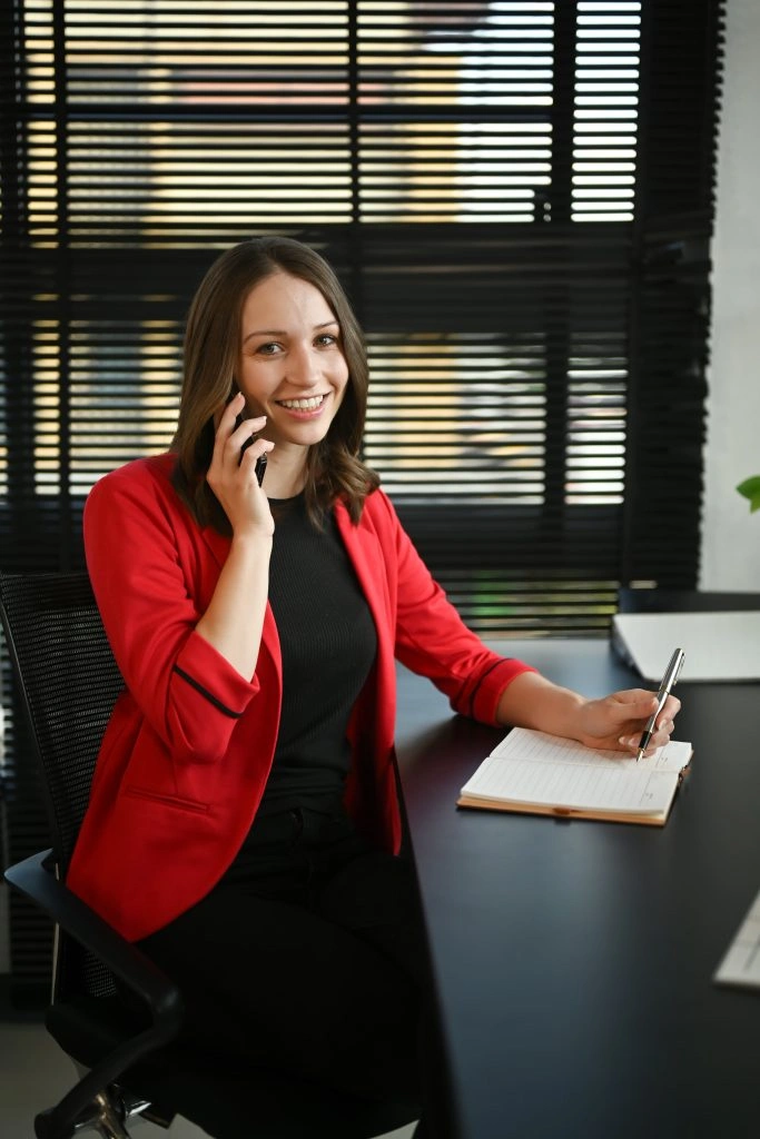 female having pleasant conversation on mobile phone.